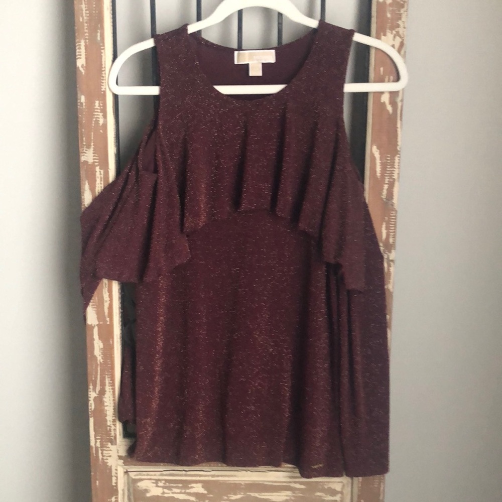 Michael Kors size M burgundy with gold sparkle long sleeve open shoulder top.